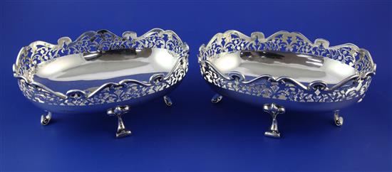 A pair of Edwardian silver oval sweetmeat bowls, 21 oz.